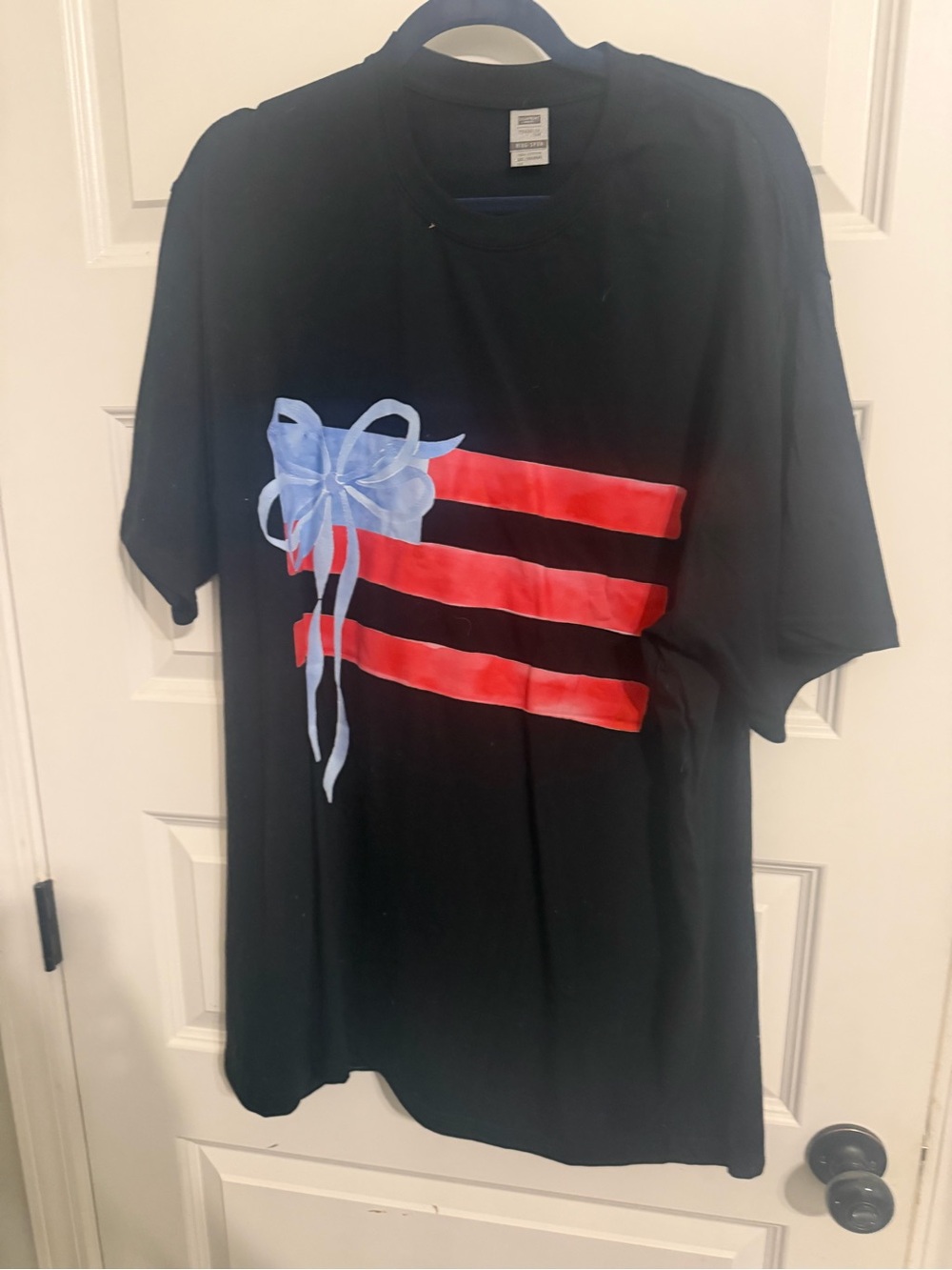 Women’s Black Graphic Tee with Red Stripes and Blue Bow